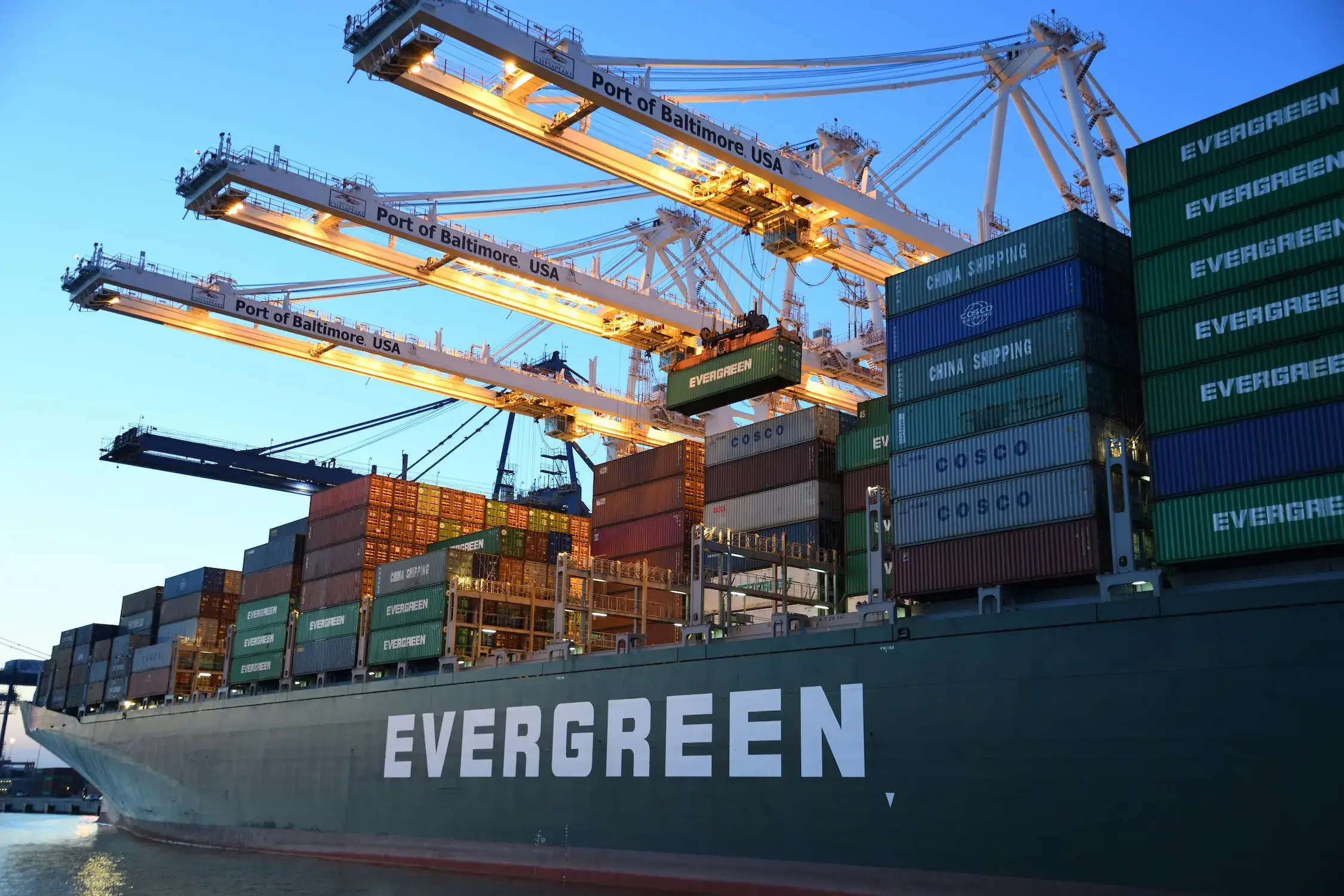 Container ship being unloaded at the dock